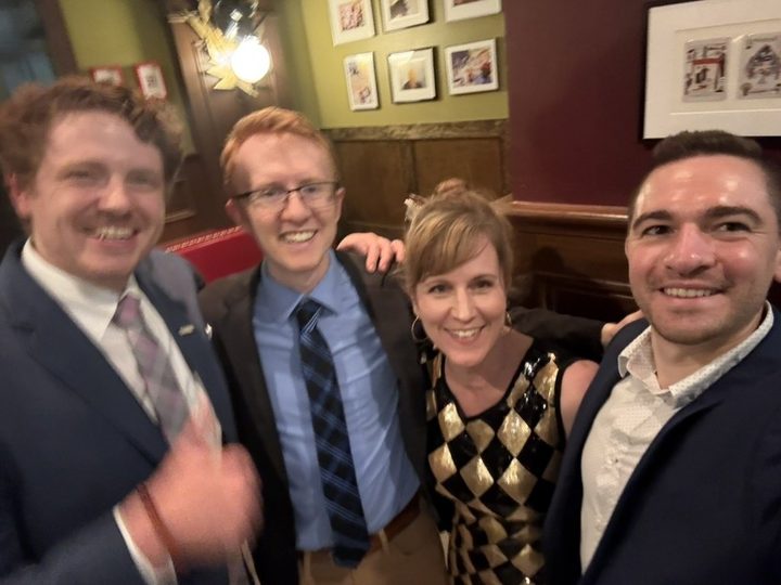 Heather Logghe with AOSA colleagues at a restaurant during the 2026 ACS Clinical Congress