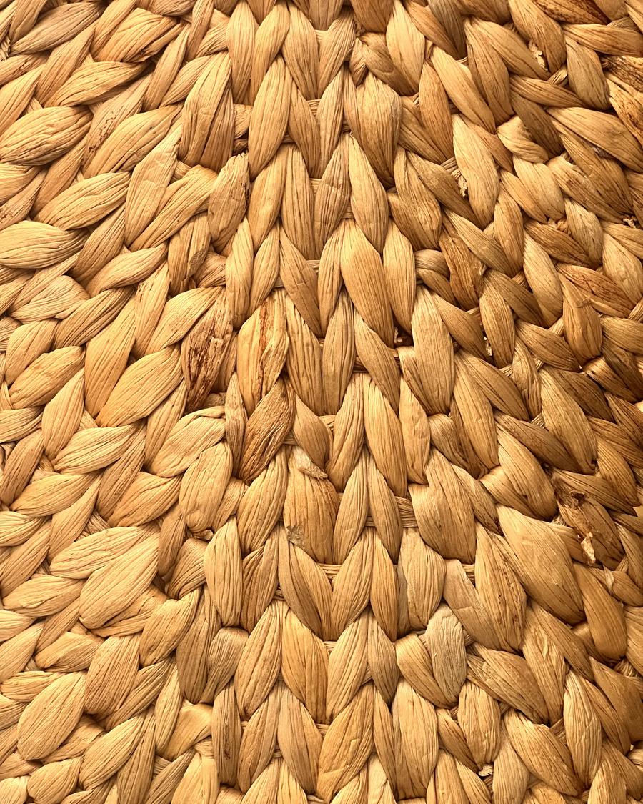 Close view of a tightly woven seagrass basket